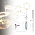 USB-powered LED plant grow light with full spectrum bulb and clear acrylic positioning stick.