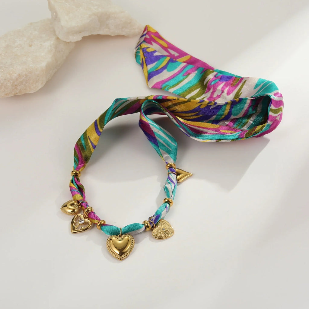 Women's stainless steel geometric pendant necklace and bracelet set with 18K gold plating and adjustable chain