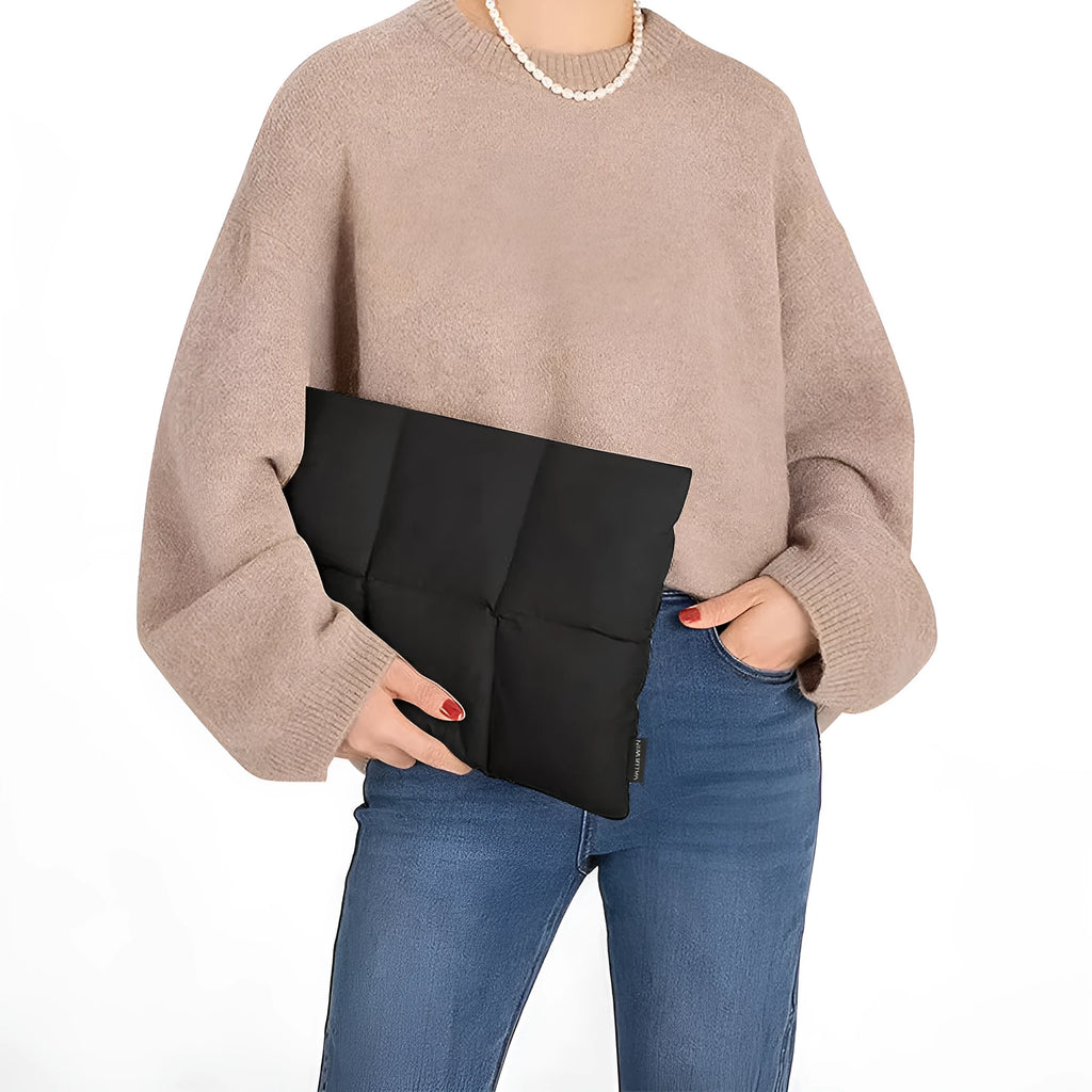 Black polyester laptop sleeve showing sewing thread detailing and soft texture for 13-15.6 inch laptops
