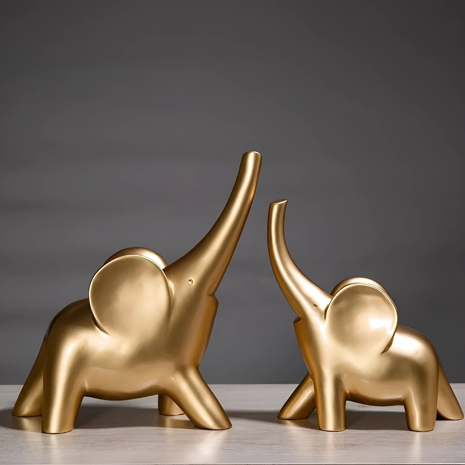 Modern resin elephant ornament figurine in rose gold or white colour with contemporary design