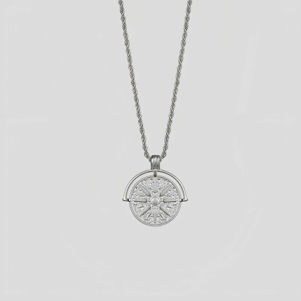 Gold titanium steel necklace with embossed sunflower pendant and geometric star elements on adjustable chain