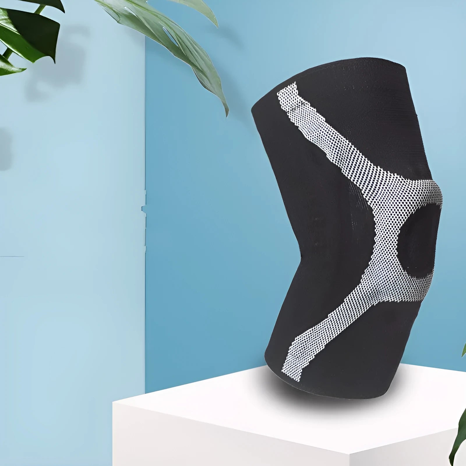 Knitted sports knee pads with silicone non-slip grippers in grey and red colours