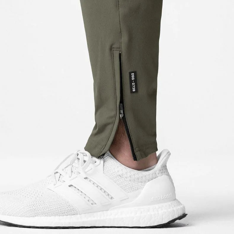 Men's ankle-tied loose casual fitness trousers in quick-drying polyester blend fabric