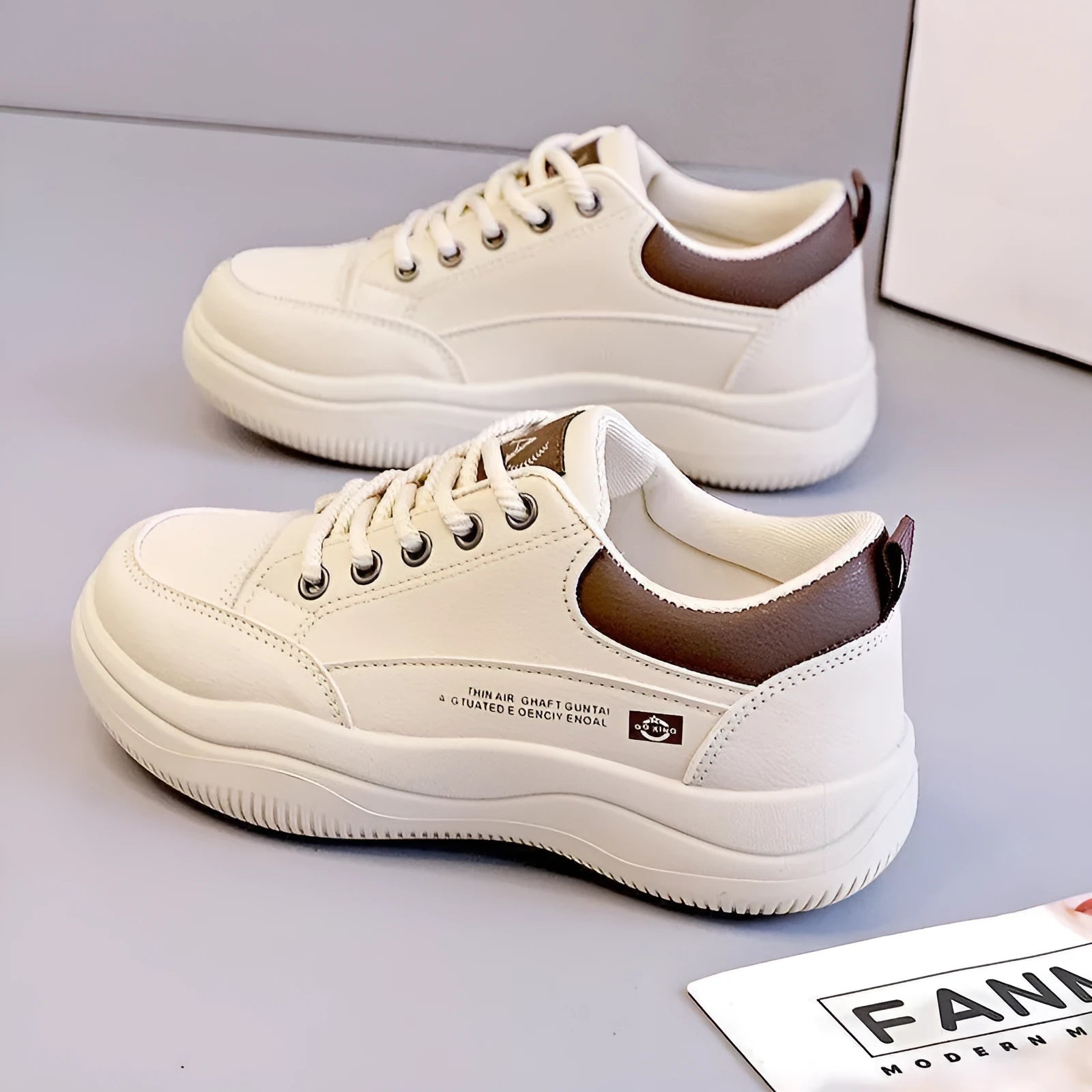 Women's white Korean-style leather pumps with cross-strap detailing and lace-up front