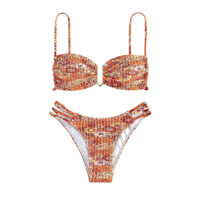 Women's high-waisted floral bikini swimsuit in blue, orange, pink, or rose red on a mannequin