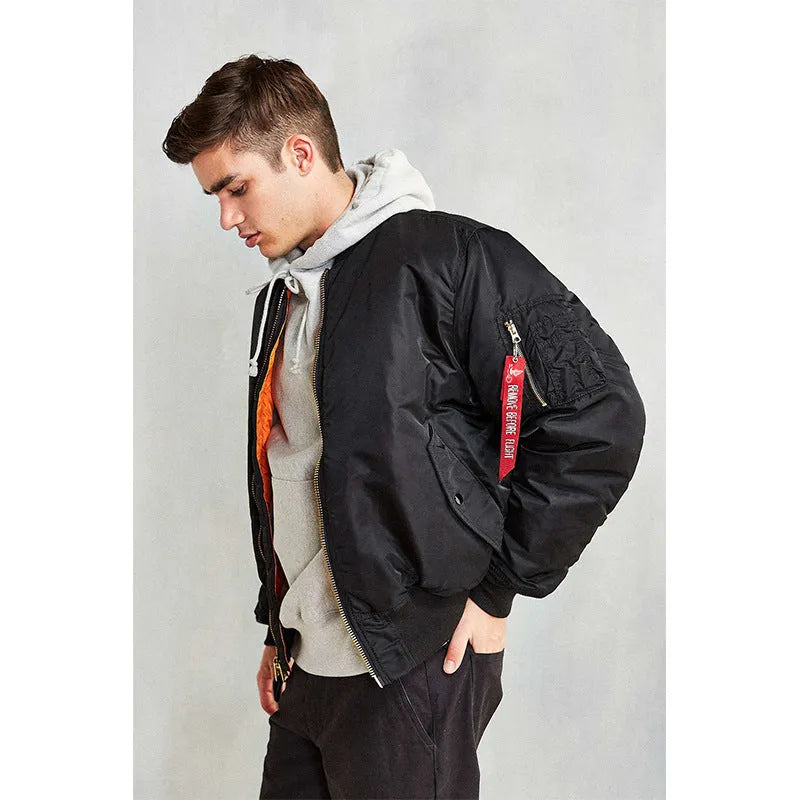 Men's loose-fit army green nylon pilot jacket on a hanger