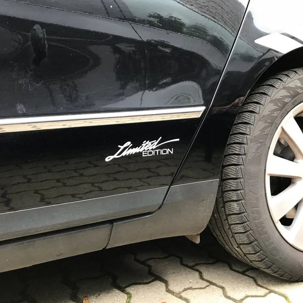 Reflective flexible plastic bumper sticker for cars, shown in black, white, and colourful design options.