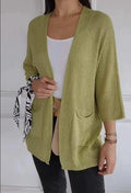Women's waffle texture cardigan coat with nine-quarter sleeves in army green colour showing pocket details