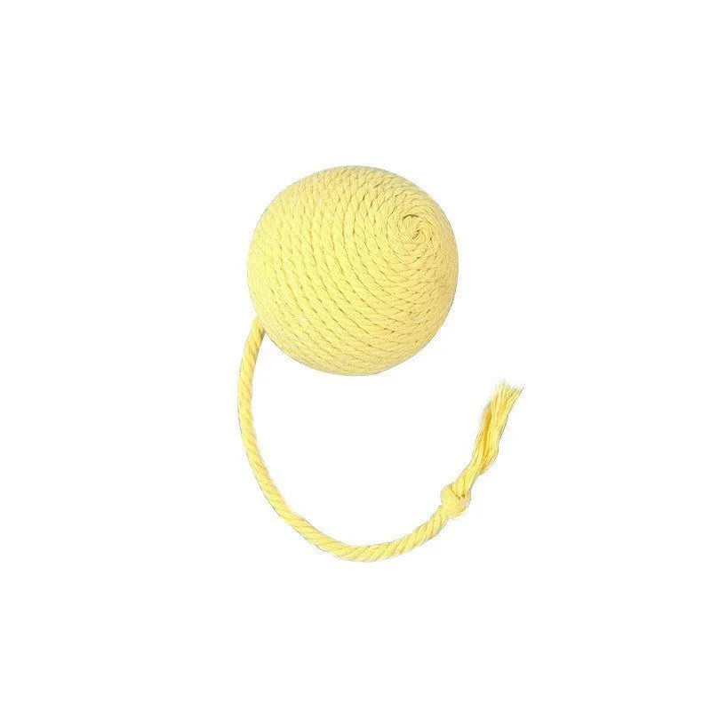 Colourful cat toy ball with an attached rope and an internal bell, shown in green, pink, purple and yellow.