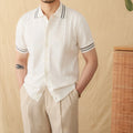 Man wearing a knitted apricot-coloured polo shirt with a lapel collar and short sleeves.