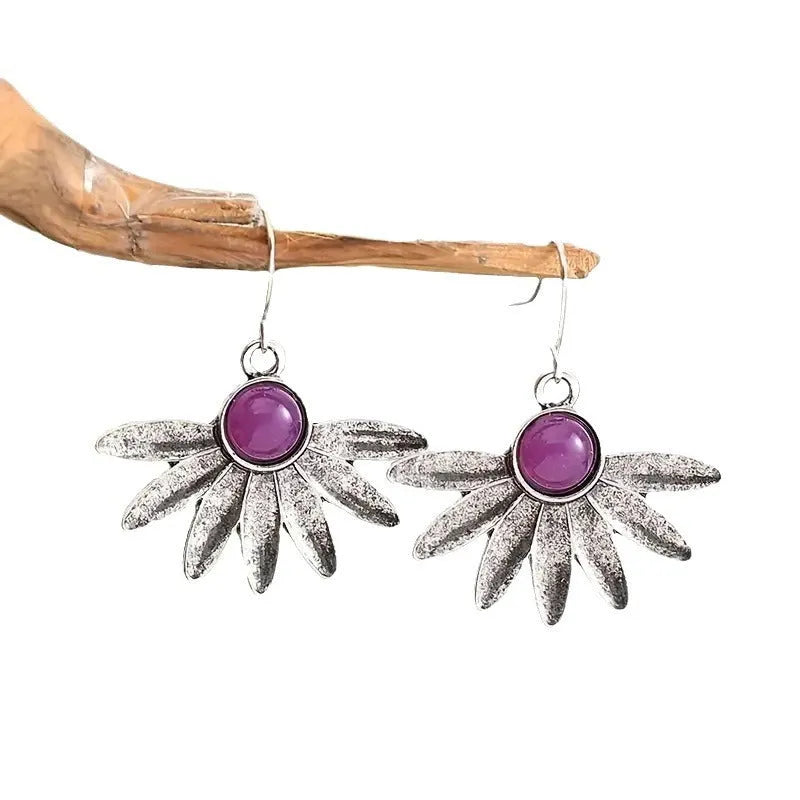 Purple Bohemian style floral earrings with animal zodiac modelling and resin accents