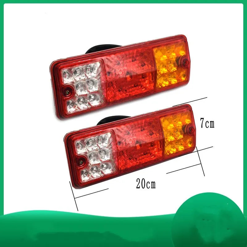 Black semi-closed taillight for an electric tricycle, showing its integrated shell design.