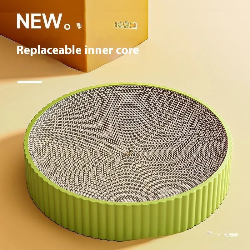 Green round cat scratching board with corrugated cardboard surface measuring 55cm diameter