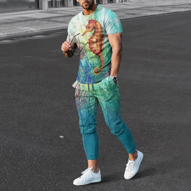 Man modelling a short-sleeved printed pullover and matching trousers from a lightweight polyester sports suit set.