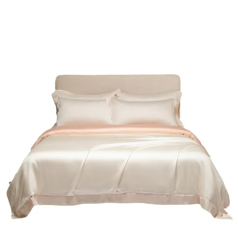 Solid colour Tencel Lyocell bed linen set with quilt cover and pillowcases on a bed.