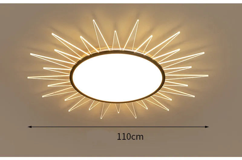 Modern round aluminium LED ceiling lamp with remote control for dimming and colour change.