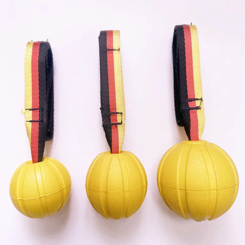 Floating EVA foam dog training ball in camouflage and yellow colours showing three size options