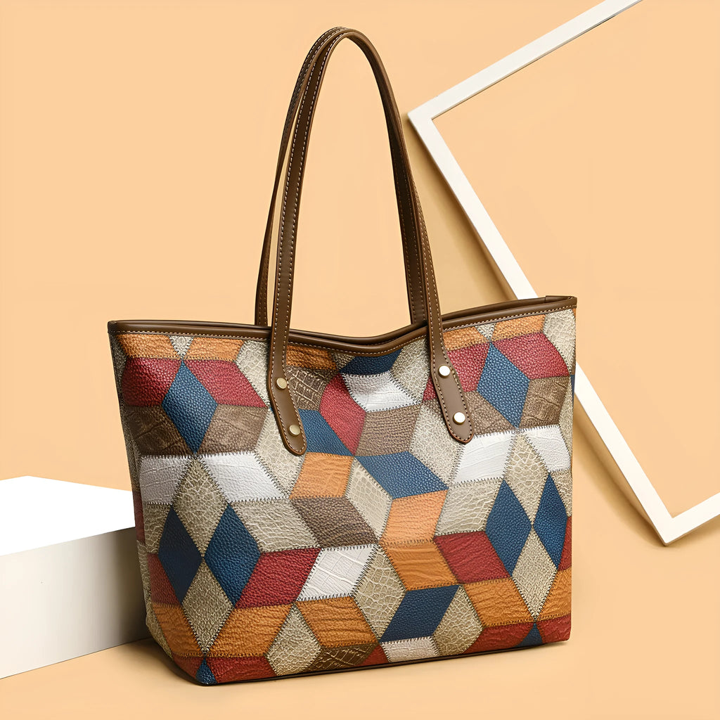 Women's large capacity PVC handbag in blue brown colour with sandwich pocket design and shoulder strap