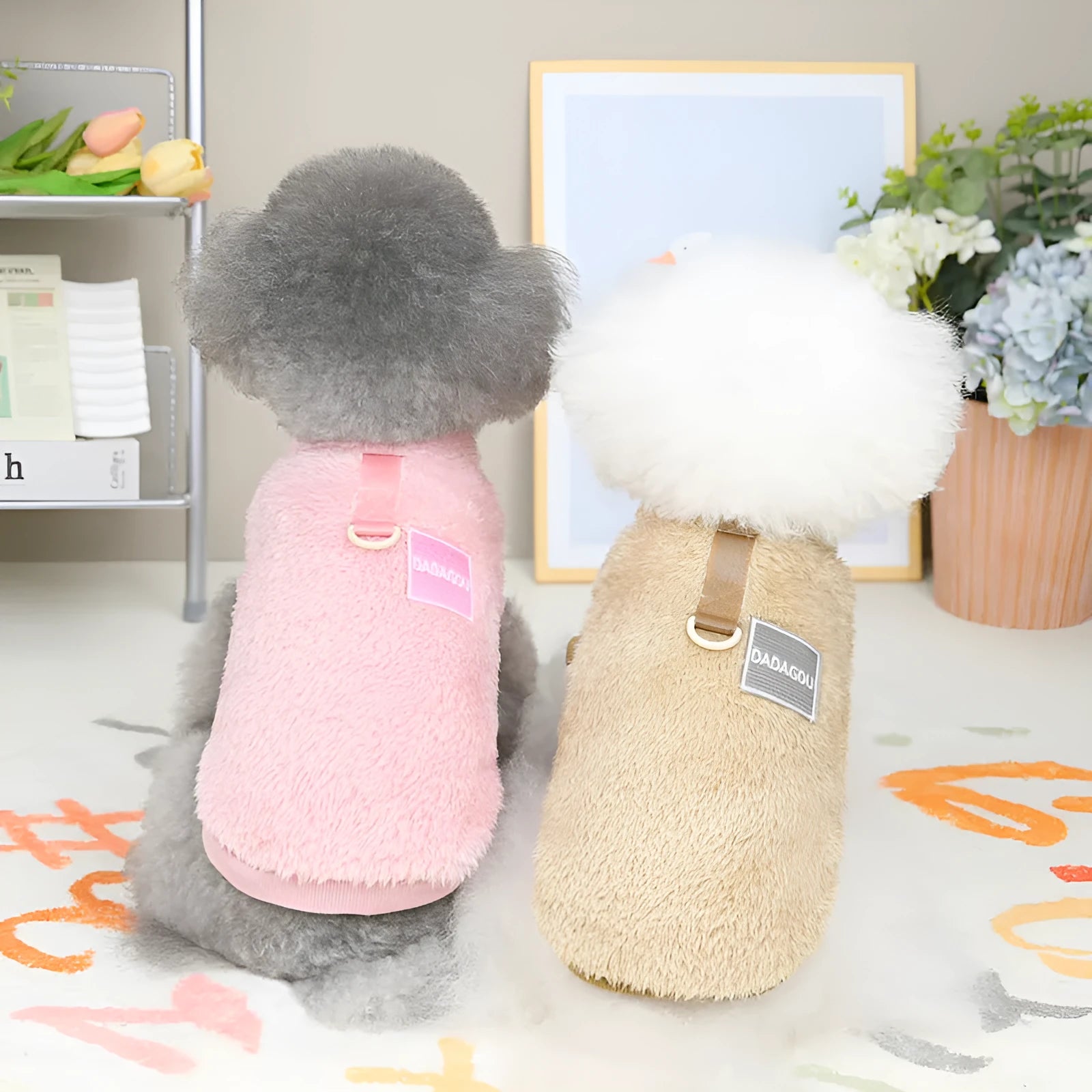 Coral fleece pet jacket for dogs and cats in blue, shown with five-colour pull rings
