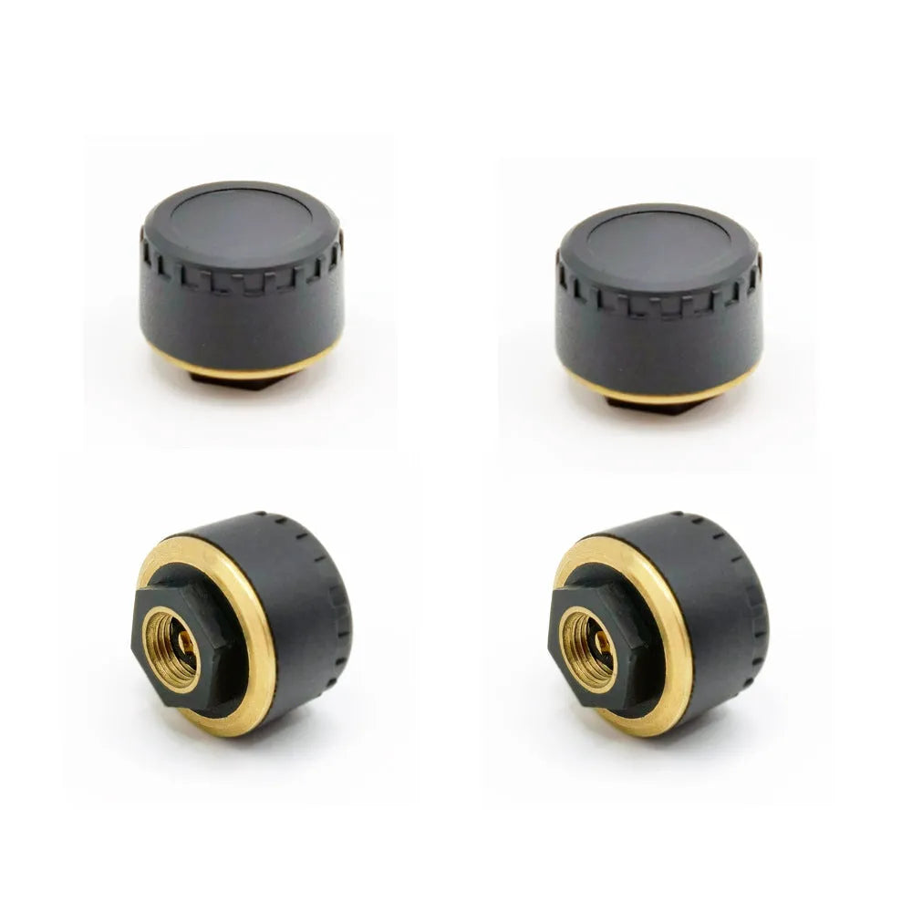 Bluetooth tyre pressure monitoring system showing four black sensors for smartphone display