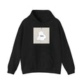 Black loose fit hoodie with drop shoulder sleeves and side pockets on a hanger.