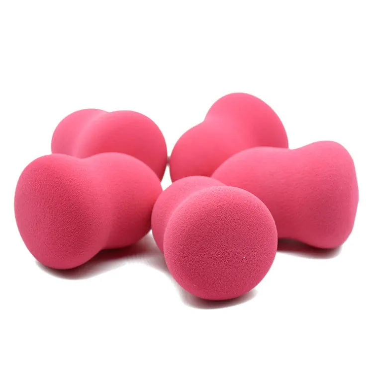 Pink makeup foundation sponge with hydrophilic non-latex material measuring 4cm by 4cm by 5.6cm