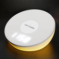 White wireless phone charger with digital clock display and alarm function