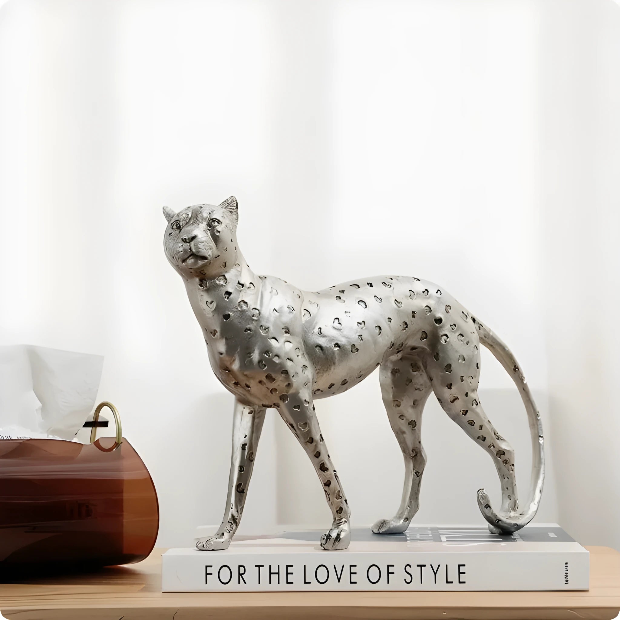 Modern leopard resin ornament sculpture in American Leopard colour on wooden shelf