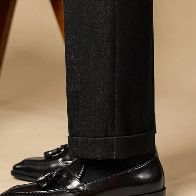 Men's black tassel loafers with genuine leather upper and British style detailing