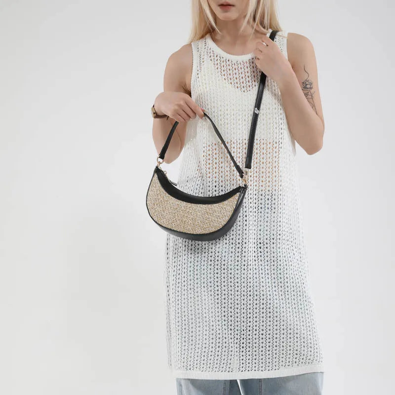 Straw dumpling-shaped crossbody bag with hard shell construction and contrast stitching details