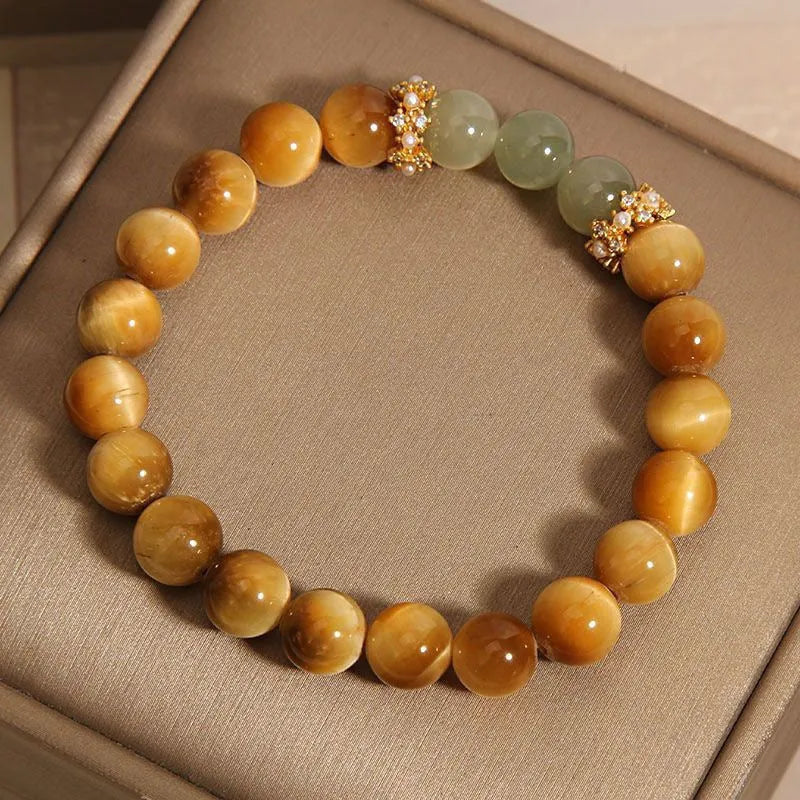 Natural yellow tiger's eye and Hetian jade bracelet with diamond treatment in U-shaped design