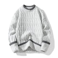 Men's loose-fit long sleeve pullover sweater in a modal acrylic blend, shown in light blue.