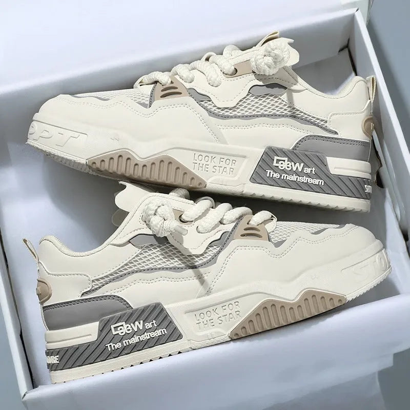 Men's white low-top board shoes with colour-matched details and rubber soles
