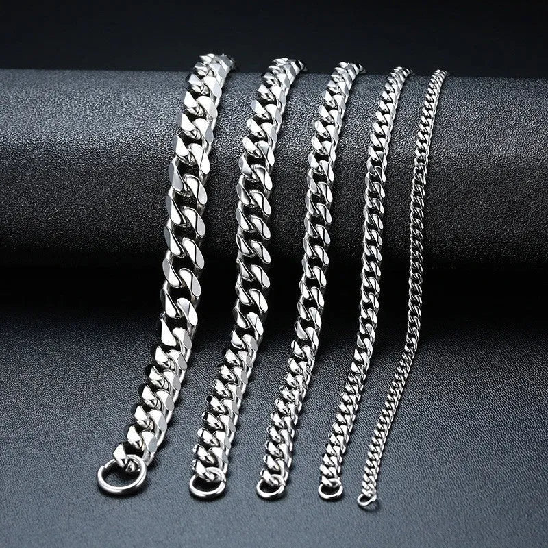 Gold Cuban link bracelet with flat six-sided metal chains in various widths and colour options.