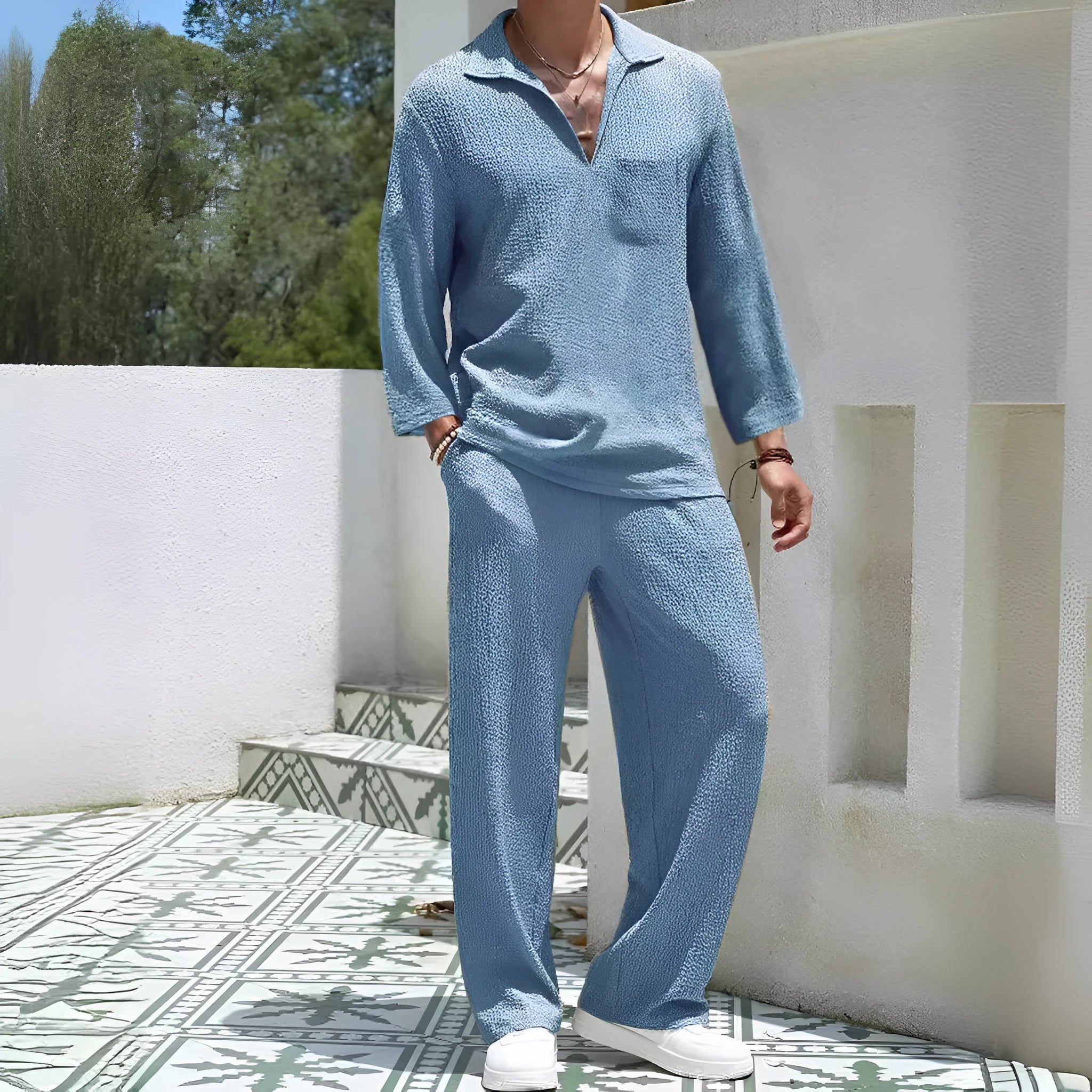 Men's casual shirt and trousers set in polyester fabric for autumn leisure wear.