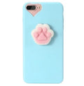 Soft silicone TPU iPhone case featuring a raised 3D cartoon cat design, shown in pink.