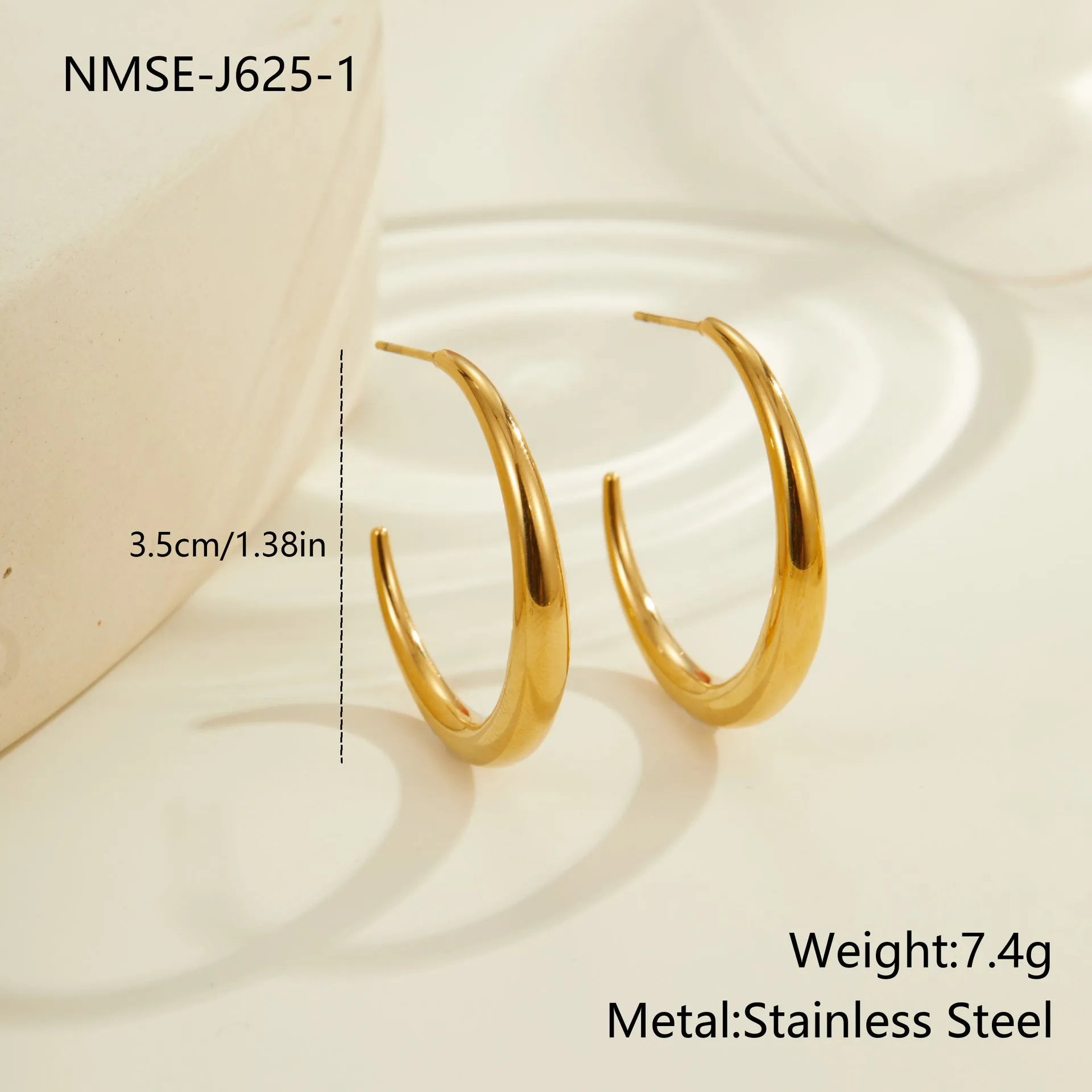 Geometric round hoop earrings in gold and steel finishes available in large and small sizes
