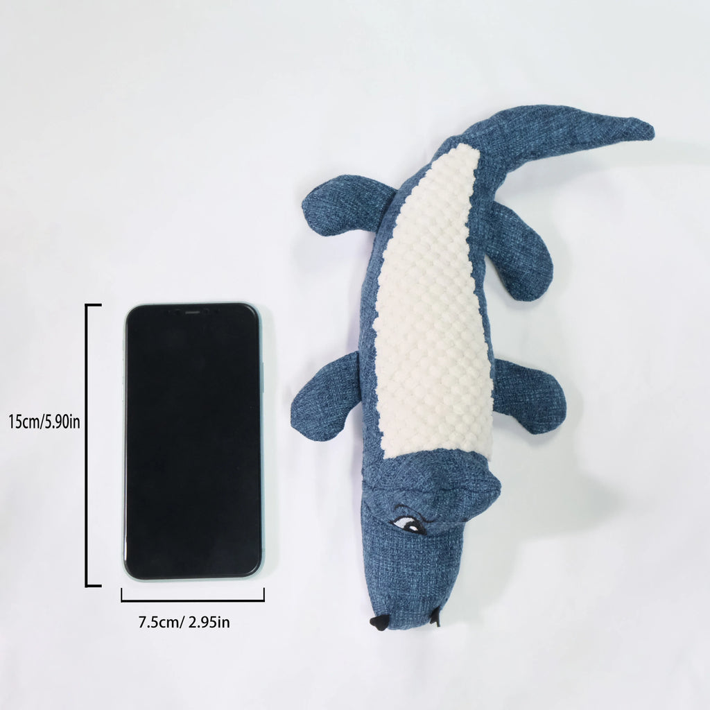 Plush corn-shaped pet toy with squeaker in blue, green, or red for chewing and grinding.