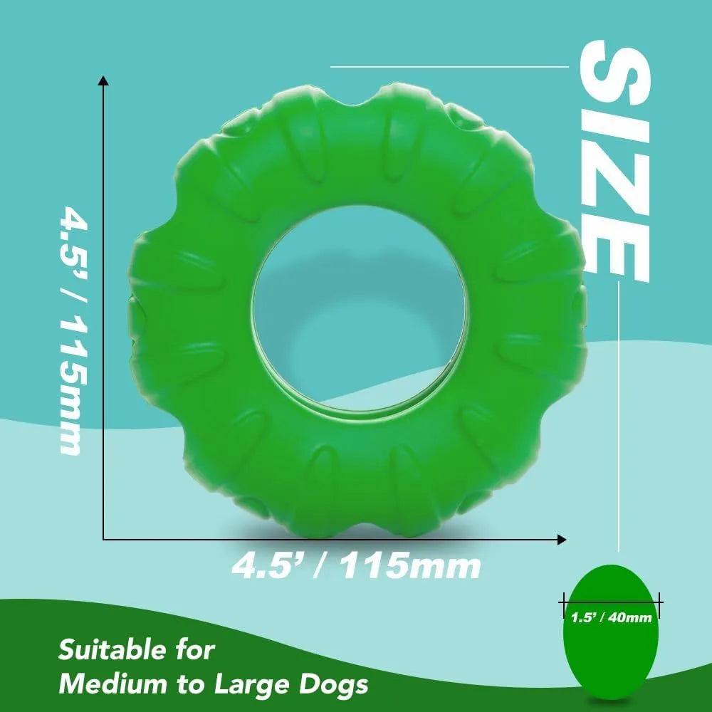 Blue natural rubber tyre-shaped dog chew toy and slow feeder with oval openings for treat dispensing.