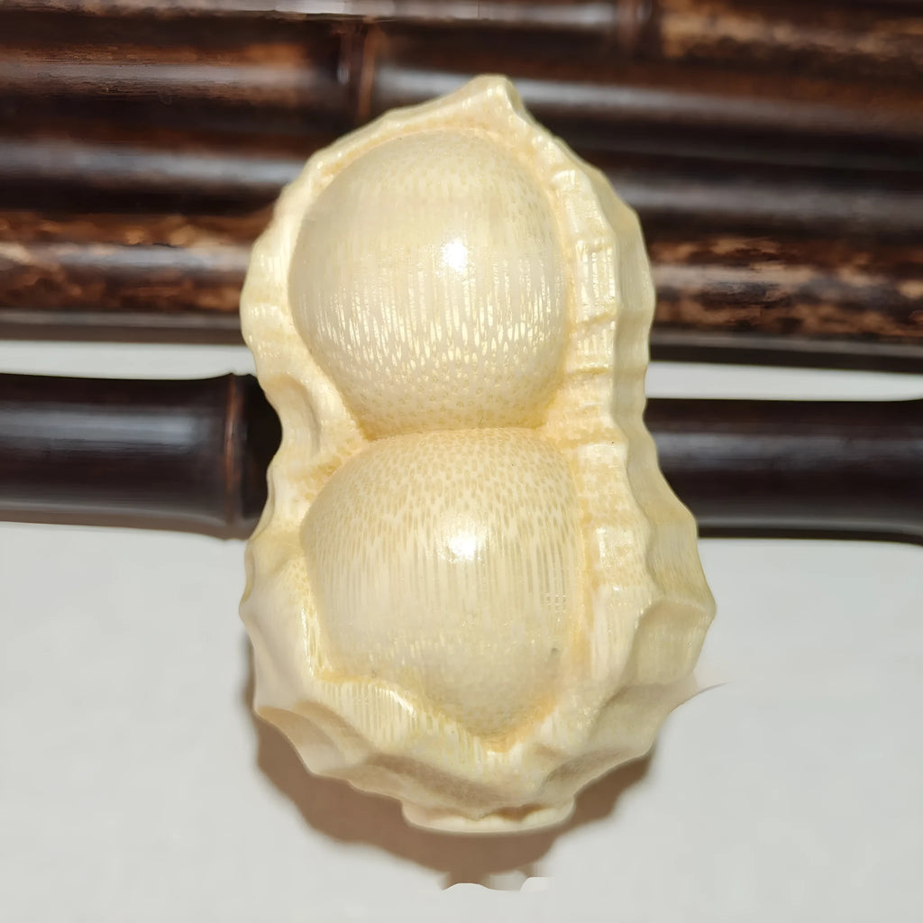 Hand-carved solid bamboo peanut ornament in modern simple style