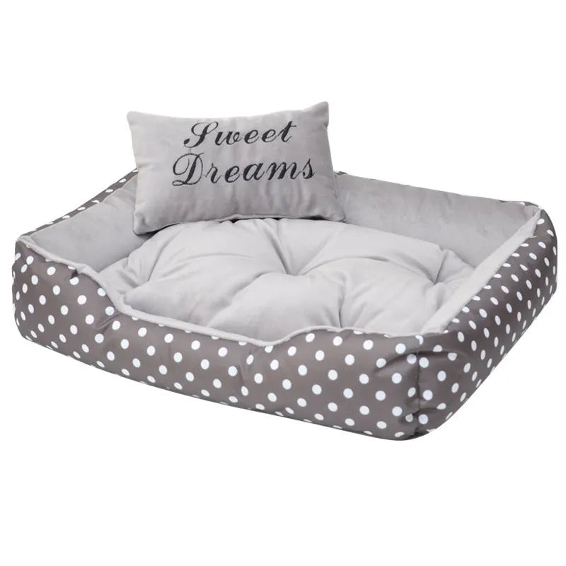 Polka dot print square dog bed with a matching embroidered pillow in grey, blue, pink, or red.