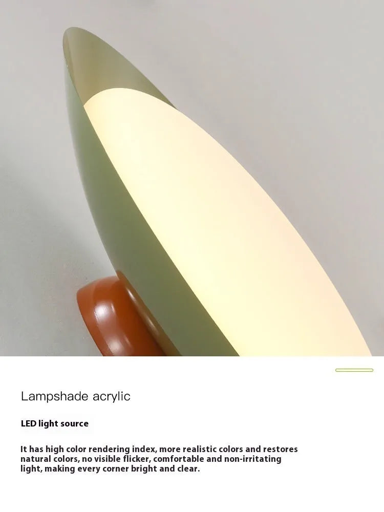 Modern minimalist flying saucer ceiling lamp with a shallow dome iron shade in a cream colour.