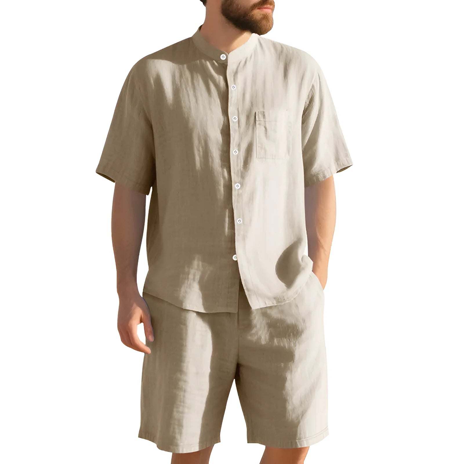 Man wearing a light-coloured short sleeve linen shirt and matching shorts from a casual summer suit set.