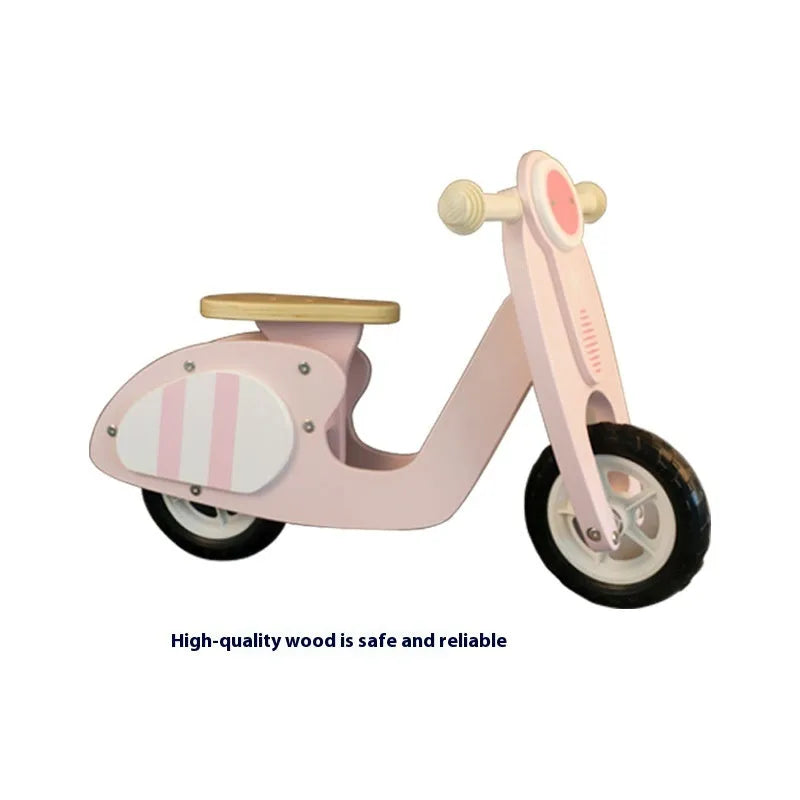 Pink wooden balance scooter for toddlers with 10-inch wooden platform