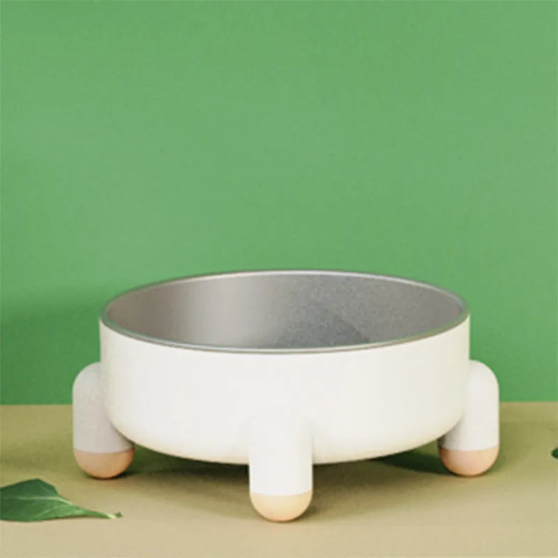 Green non-slip stainless steel pet food bowl with anti-overturn base and raised foot