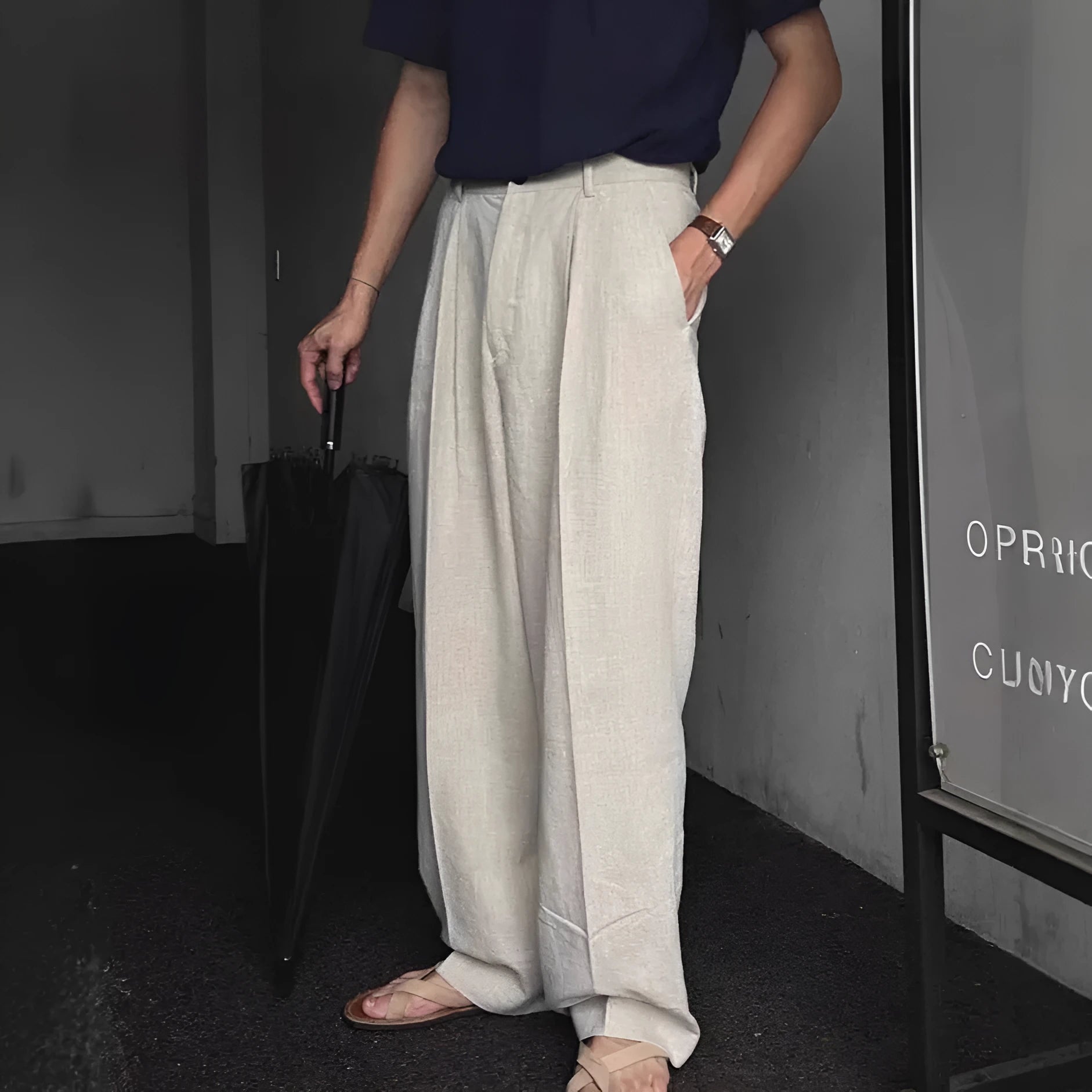 Men's loose lightweight cotton linen trousers in apricot colour showing wide-leg Korean style design