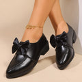 Women's British-style leather shoes with bow decoration and pointed toe