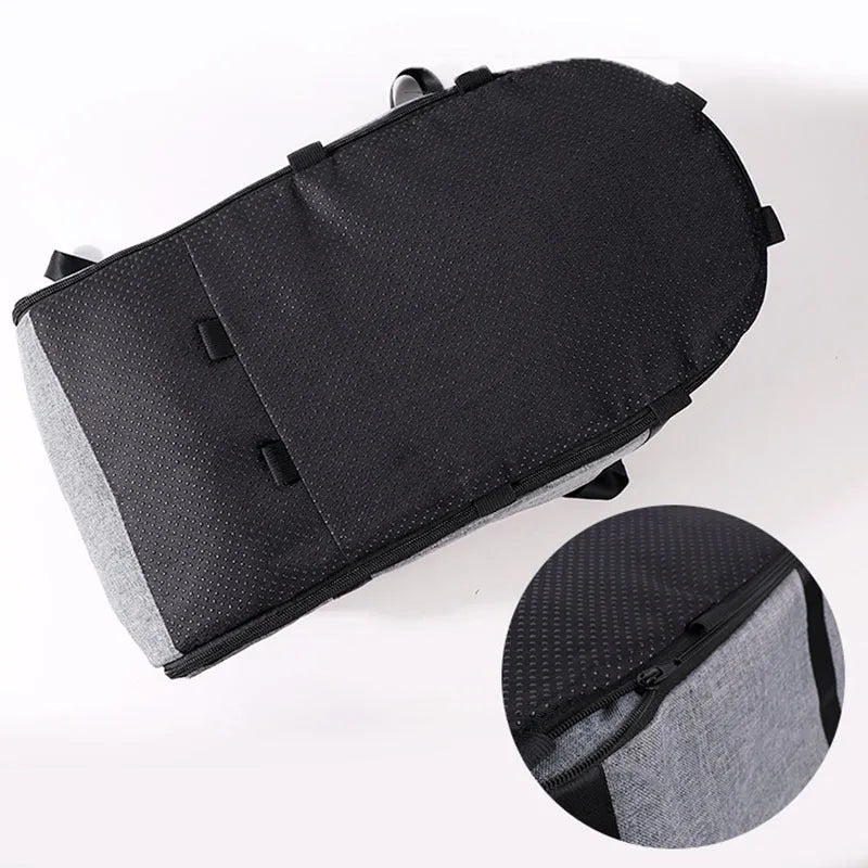 Blue cloth dog kennel with mesh ventilation panel for car travel and outdoor use.