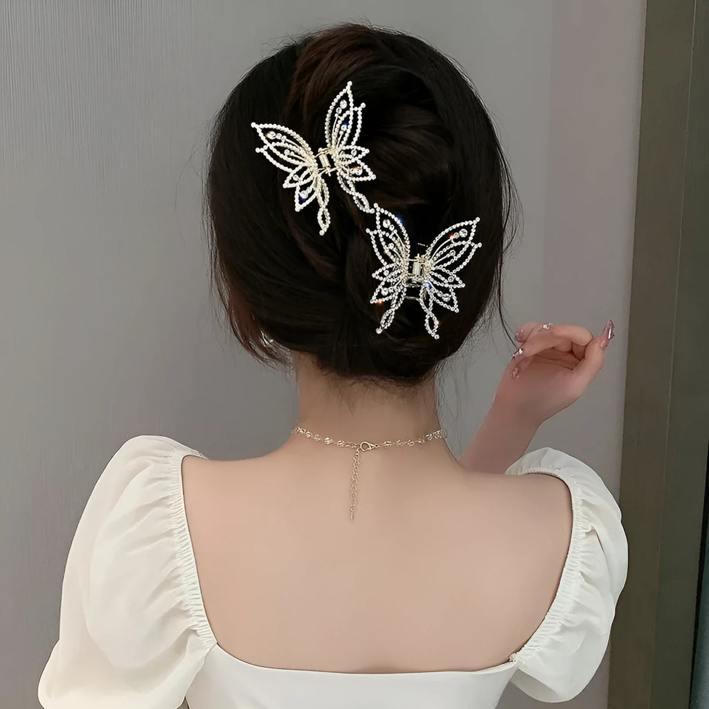 Butterfly hair clip for women with alloy construction and electroplated finish in rhinestone or pearl style
