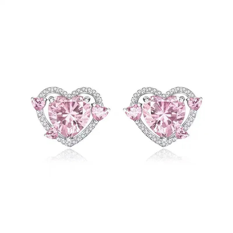 Guardian Heart white K gold tone electroplated copper stud earrings with heart shape design